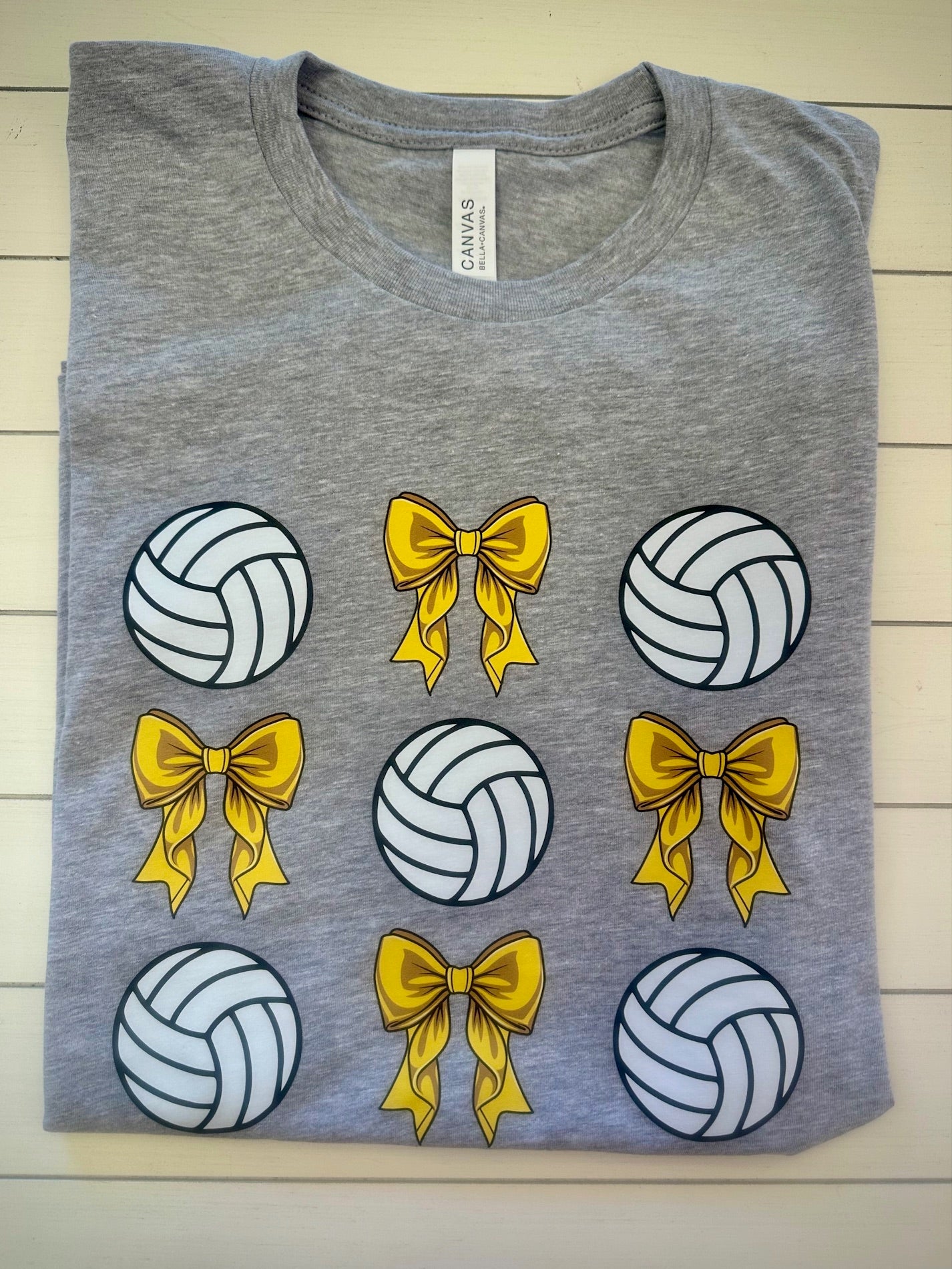 Cayuga Volleyballs and Bows Graphic Tee