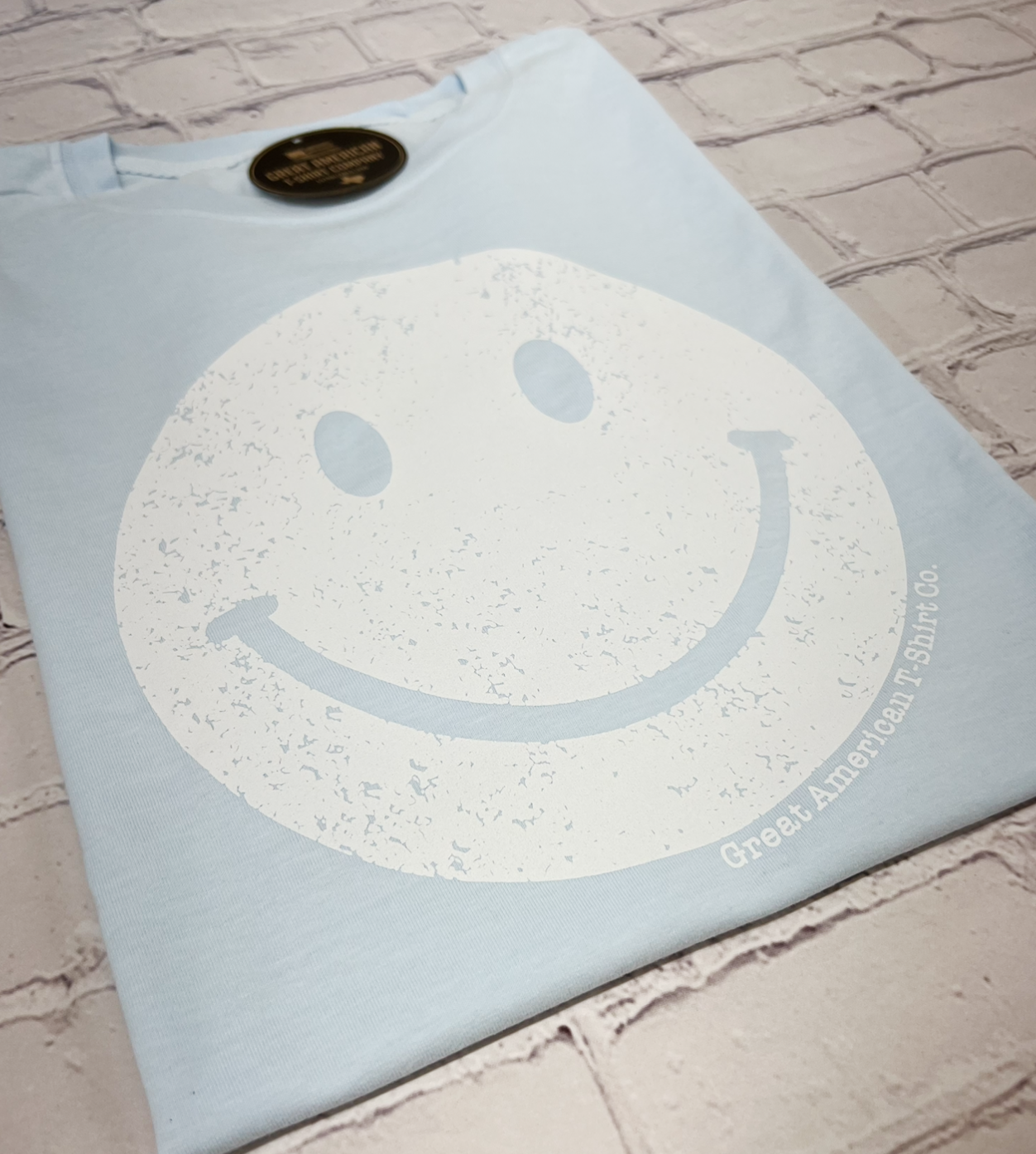 Light Blue Smiley Face Graphic Tee